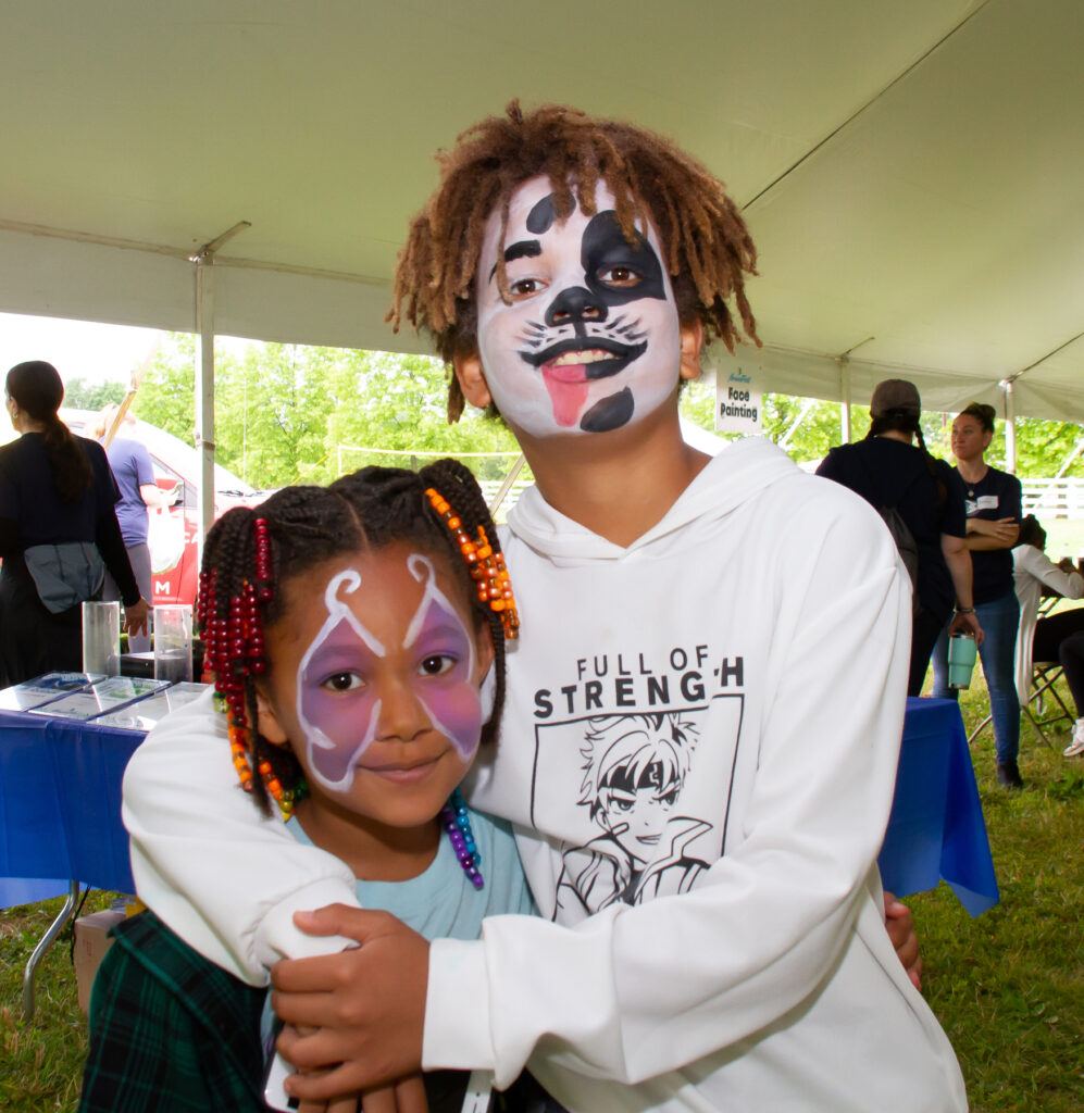 Kids love getting face painting designs at NorwesFest's Family Fun Day