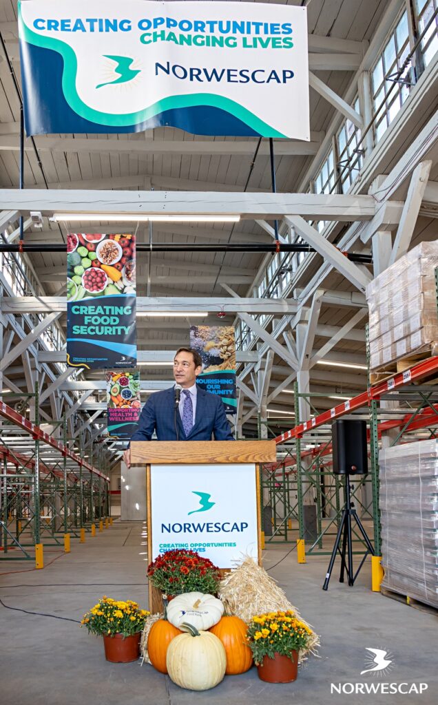 Among the critical improvements made to the Food Bank Annex, expanded storage capacity tops the list. With more storage options, we can now offer those in need a wider variety of healthier foods, with greater nutritional value. Examples of farm fresh produce, succulent peaches and crisp apples, that stood-in as decorations for the event are also the real-life examples of balanced diets and choice-method of distribution that Norwescap and our partners are seeking, giving not-only better health outcomes but more dignity to those needing resources from a food pantry.  